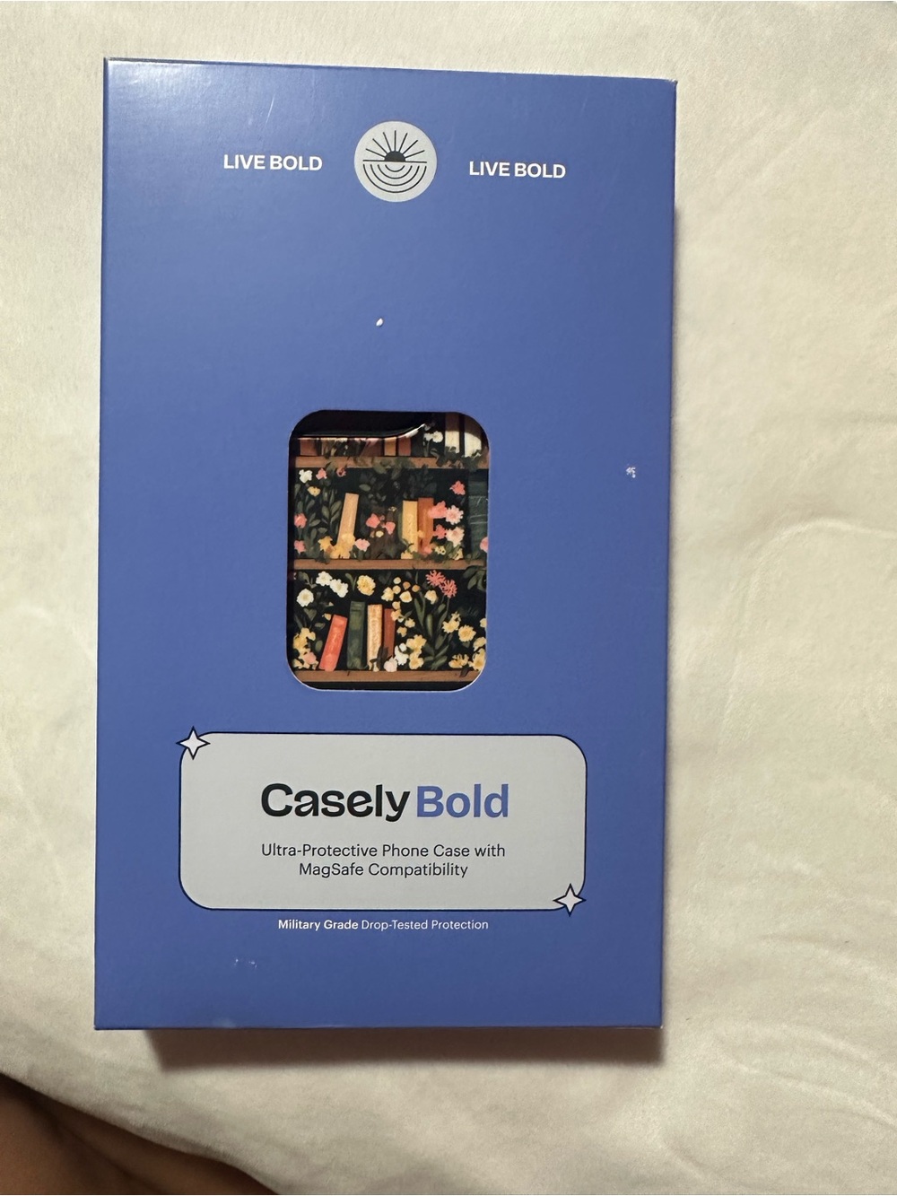 Casely Bold Floral Bookshelf Phone Case - iPhone 14 Pro